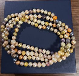 Kasumi-like ripple freshwater pearl necklace featuring pink/gold baroque pearls