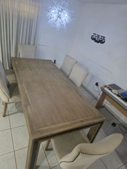 Expanding wooden Dining table comes with 6 (or 10) chairs