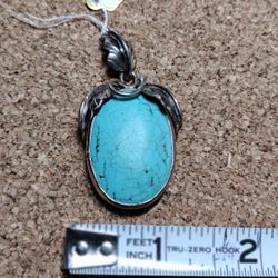 Faux Blue Turquoise Set In Tibetan Silver Pendant