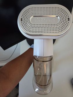 Handheld cloth steamer