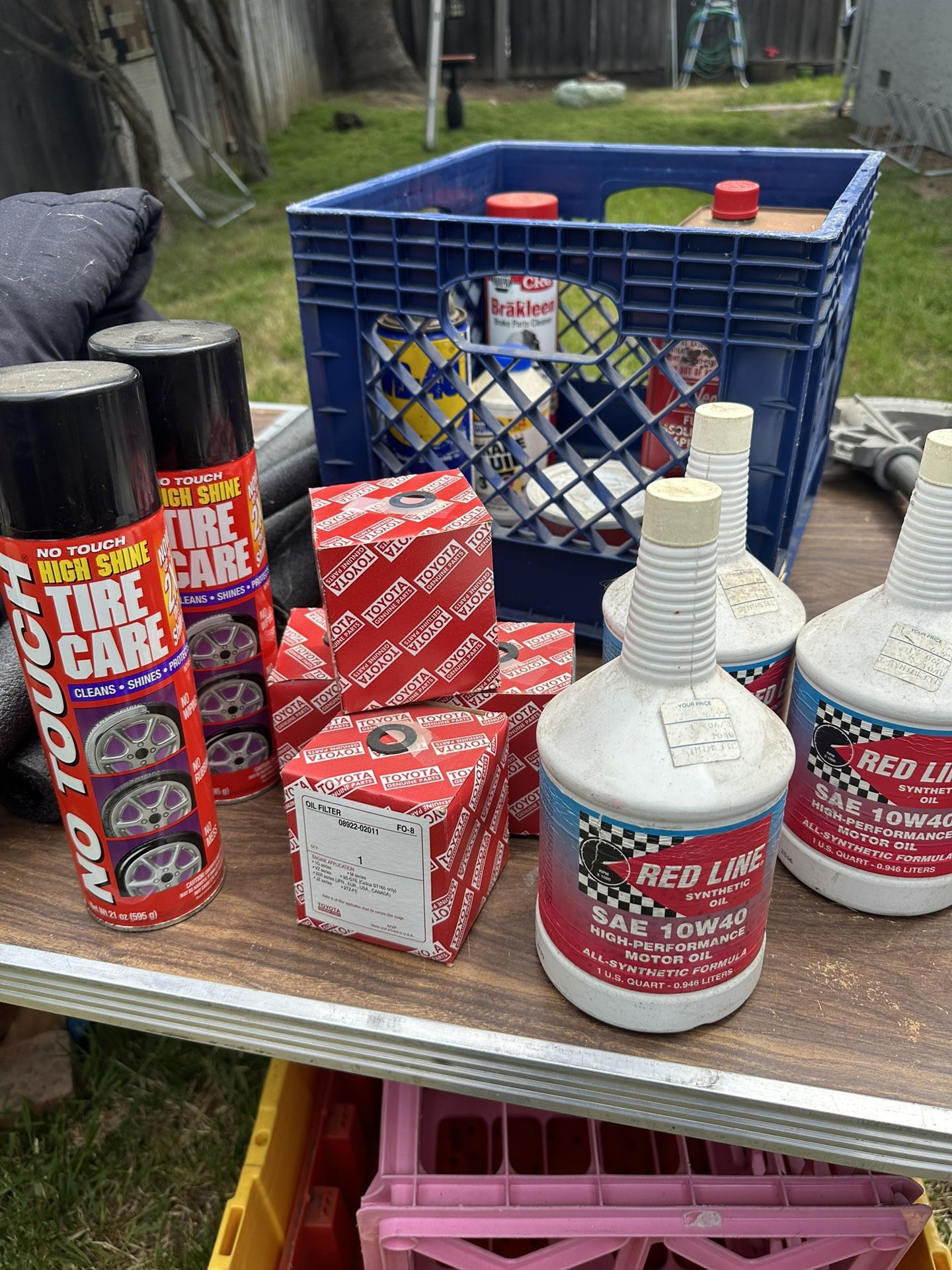 Toyota Oil Filters And 3 Quarts Of Red Line Oil And Two Cans Of Wheel Bright Conditioner