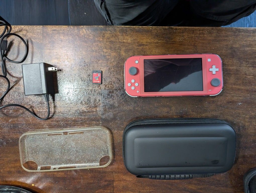 Nintendo Switch Lite W/Mario Oddisey