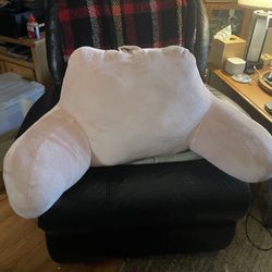 Bed, couch or floor pink pillow 