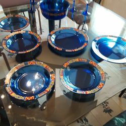 Kente (American Brand) dinner set 8 dinner plates ,7 beverage glass,1 big Salad bowl, 8 salad plates, 4 flutes,4 goblets, 2 candle sticks