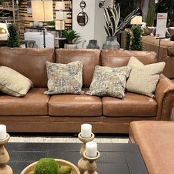 Carianna Caramel Sofa
Ashley Furniture$10 Down Payment And Financing Available