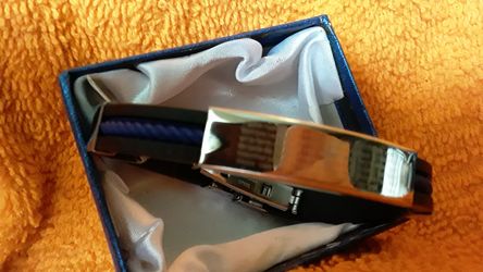 Stainless steel men's bracelet with the Lords prayer in Spanish.