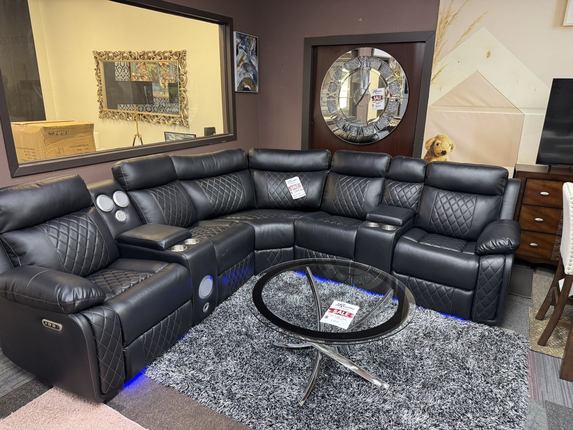 BLACK LEATHER ELECTRIC RECLINER SECTIONAL WITH SPEAKER SYSTEM