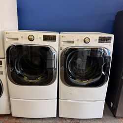 LG Side-by-Side on Storage Drawer Pedestal Front Load Washer and gas Dryer set