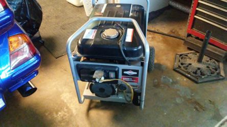 Briggs and Stratton gasoline generator with 4 120 volts outlets.