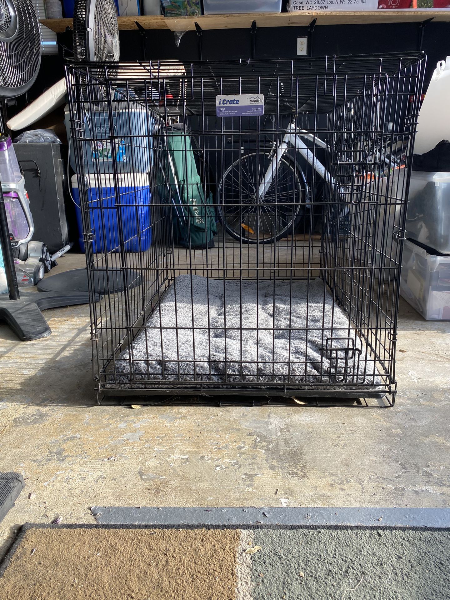 DOG CRATE WITH BED BARELY USED 