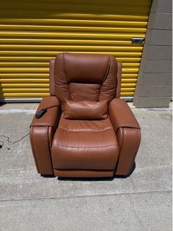 Leather motorized massage powerlift recliner. $600. Will deliver for a fee