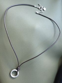 Fossil leather and silver tone necklace loop ring