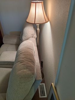 Power reclining love seat with center console.