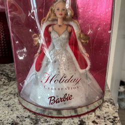 I got this Barbie special edition, 2001. I don’t know how much is it worth shoot me an offer.