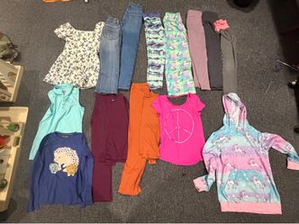 Variety of girls clothes in a size 10