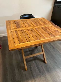 Outdoor folding dining table