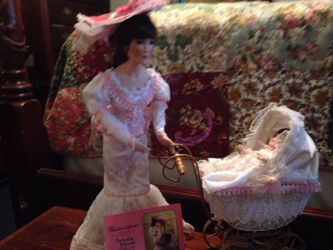 Victorian porcelain dolls/mother, baby, and stroller