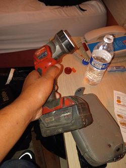 a Milwaukee light ,and a DeWalt drill