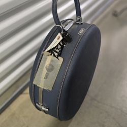 Vintage American Tourister Tri-Taper Round Blue Suitcase.