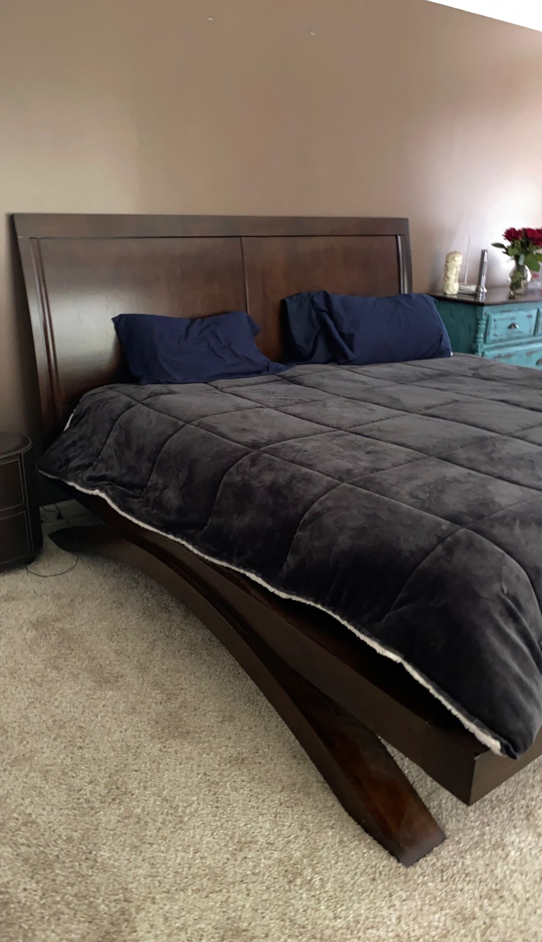 Nice King bed with king mattress. Approximately 1 year old.