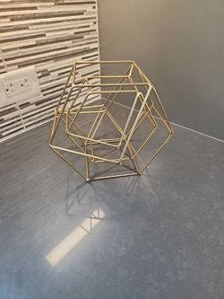 Gold metal hexagonal decorative piece