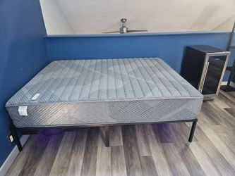 Queen Mattress on Metal Bed Frame