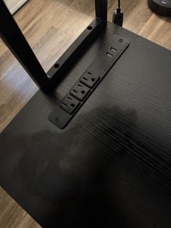Black Desk with Built-In Power Outlets and USB Ports