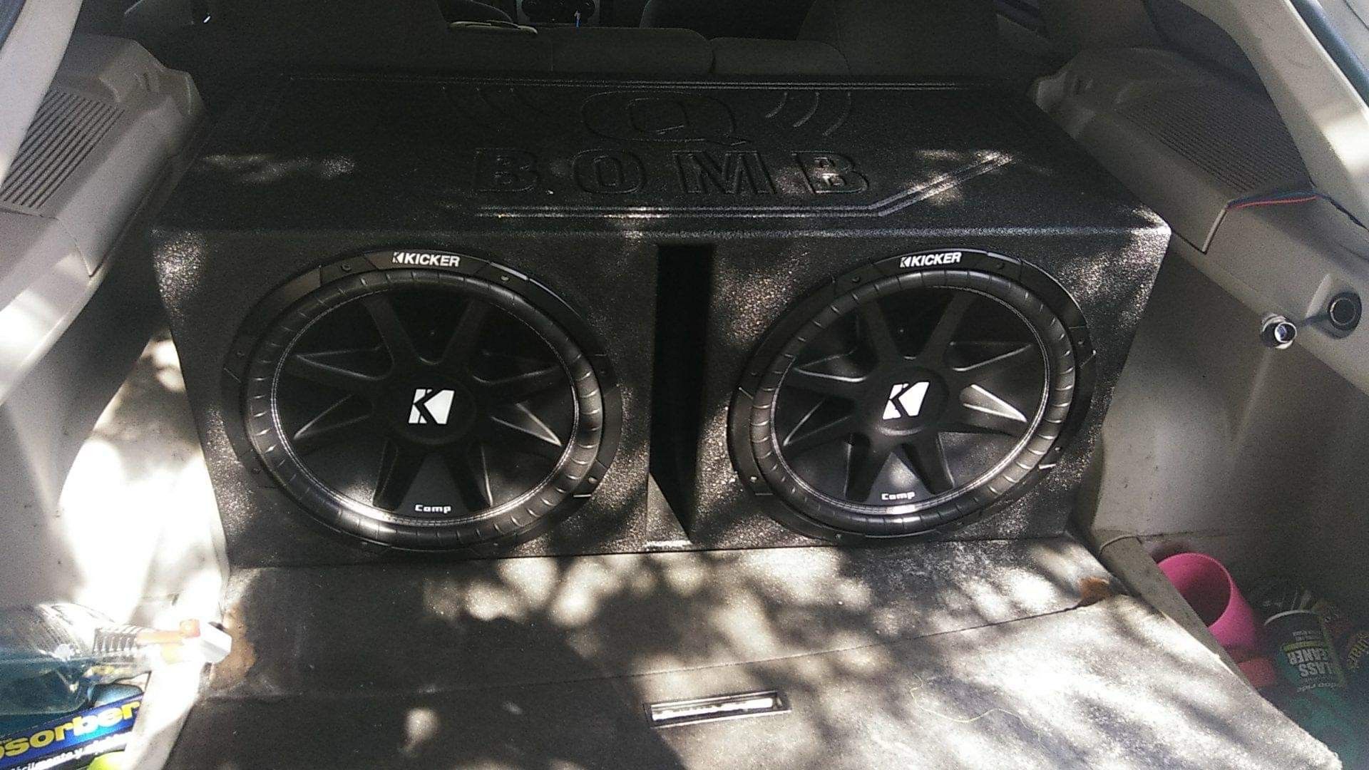2 15 subs kicker with 5000 planet audio amp in pro box