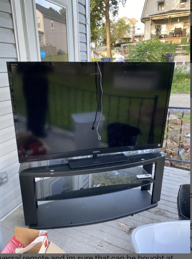 TV STAND ONLY. TV HAS BEEN PICKED UP.