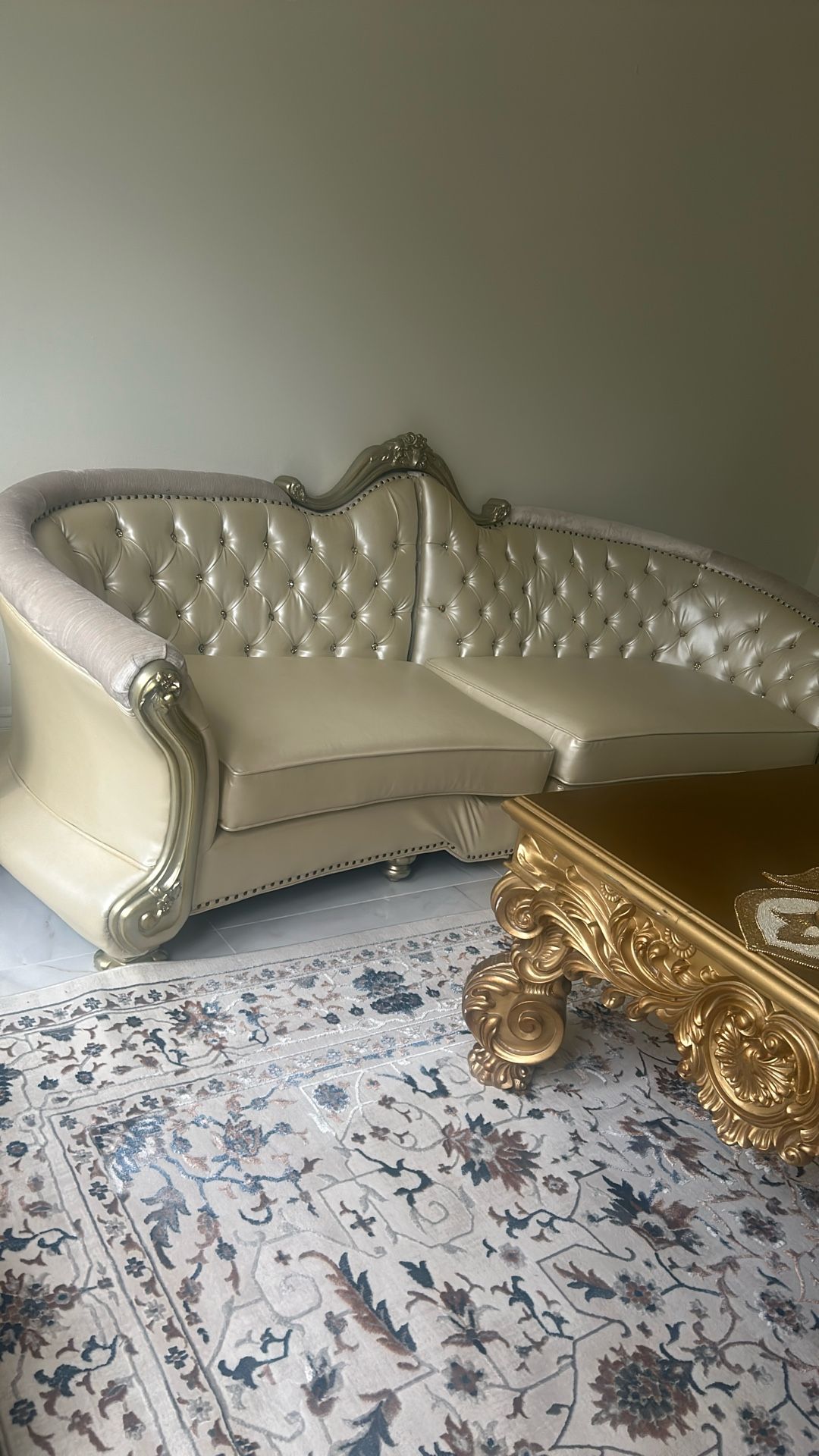 Cream Couch With Two Chairs Set And The Table