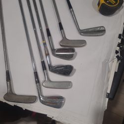 Golf Irons And Putters.