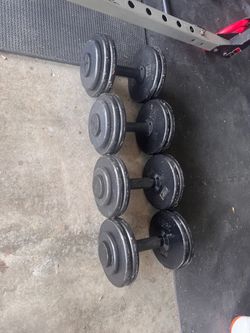 Pair of 45lb and 50lb dumbells (Adjustable)