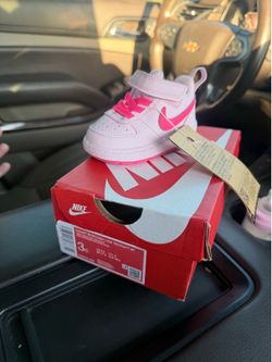 Pink Nike shoes