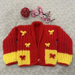 NEW. Knitted cardigan for girls 5-7 years. Knitted with knitting needles from soft, thick yarn. Handmade.