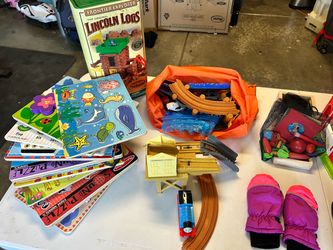 Misc. toddler toys, puzzles, eating utensils and train set