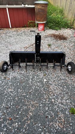 Tow-Behind Lawn Plug Aerator