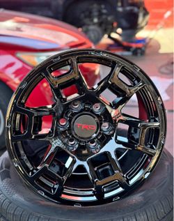 17x9 TOYOTA TRD WHEELS GLOSS BLK RIMS 6x139.7 + 265/70R17 A/T TIRES TACOMA 4RUNNER FJ CRUISER