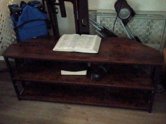 Tv stand it plugs into wall lights up