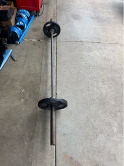 Olympic weightlifting Bar and 25 lbs Plates