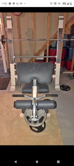 POWERHOUSE WEIGHT BENCH WITH 300 LB OLYMPIC WEIGHT SET LIKE NEW