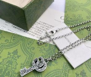 Retro old necklace key-shaped vine carving