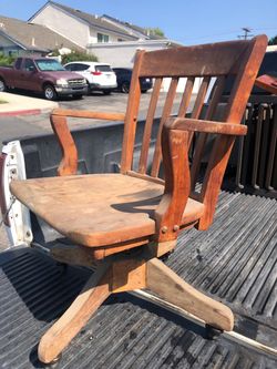 Antique wooden office chair with coasters