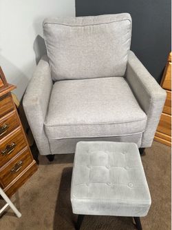 Chair with foot stool