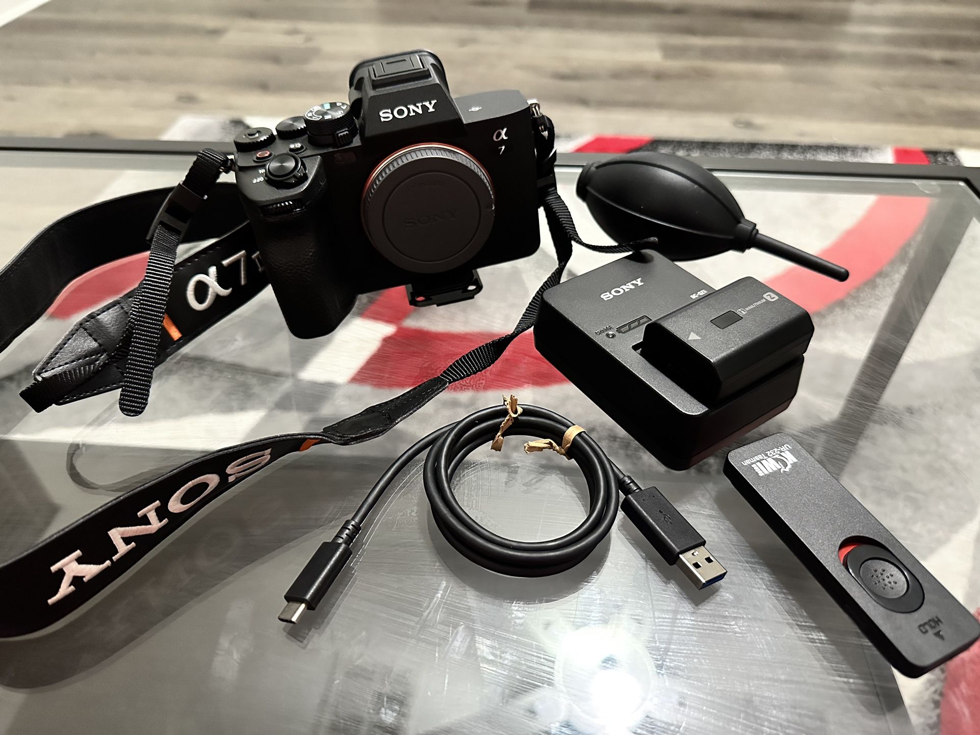 Sony A7iv and Tamaron 28-75mm Lens with additional battery, Charger And Lens Cleaner And Remote Shutter Control