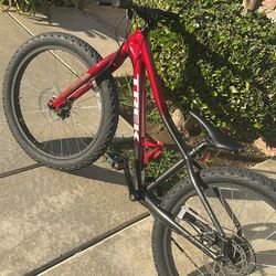 Trek Red Bike With Helmet