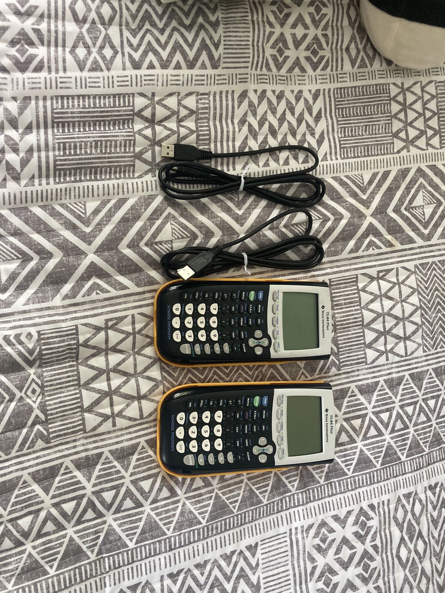 2 TI-84 Texas Instruments calculators
