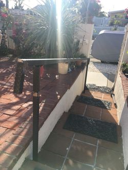 Custom Hammer notched handrails and ironwork