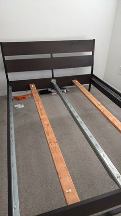 Queen size Ikea frame used with queen size mattress