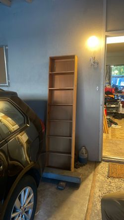 Shelves 6 ft by 2 feet wide and 8 inches deep.
