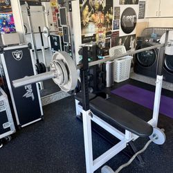 Weight Bench With Lat, Pulldown, Incline, A Bunch Of Weights And A Pull-Up Bar
